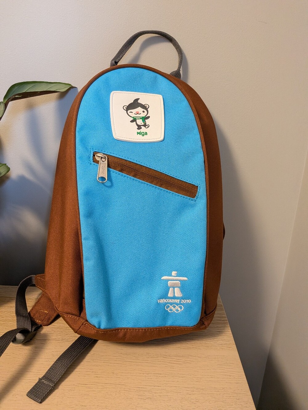 2010 Vancouver Winter Olympics Miga Brown and Blue Mini Backpack. 8” x 13” x 4”